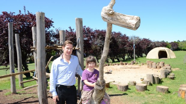 Thriving: six year old Molly, pictured with principal Joel Hines, has taken to the nurturing environment of Daylesford's Dharma school. 