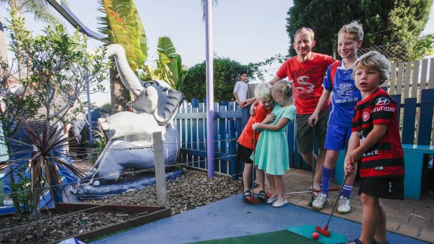 Jonathan Wilkes with (left to right) son Nathan 7, niece Abigail Soper 7, nephew Michael Habbard 12 and Benjamin 6 at the closure of Ermington Putt Putt.