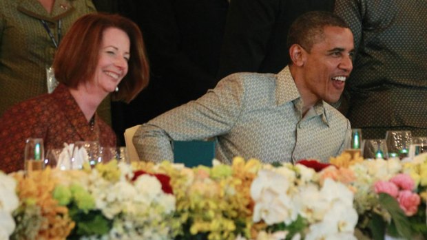 Relaxed in Phnom Penh: Prime Minister Julia Gillard with President Barack Obama at the East Asian Summit dinner.