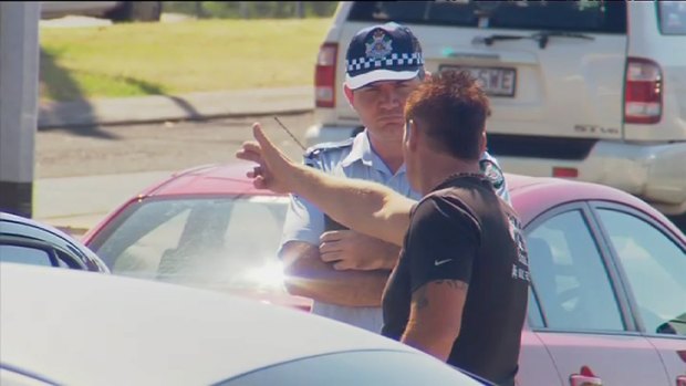 The victim of a road rage shooting speaks to police. Photo: Ten News.
