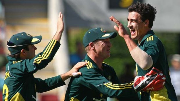 Mitchell Starc celebrates one of his wickets.
