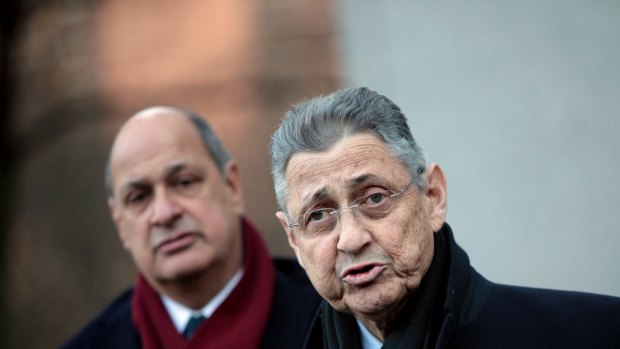 New York State Assembly Speaker Sheldon Silver (right) walks out of the Federal Courthouse after his arraignment on bribery and corruption charges on Thursday in New York City. 