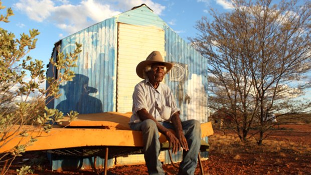 Banjo Morton sits outside his tin shed at Honeymoon Bore.