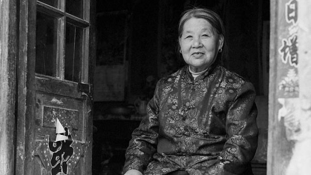 Forgotten woman: A portrait of Su Xi Rong, age 75, whose feet were bound.