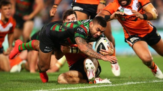 Prolific: Nathan Merritt scores against Wests Tigers.
