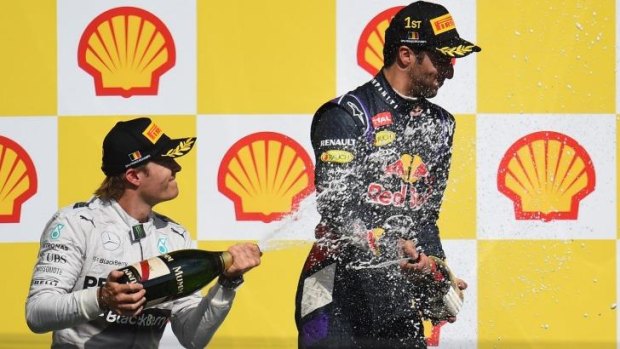 Nico Rosberg (left) celebrates with Daniel Ricciardo after their podium finish at the Belgium GP.