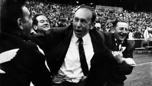 Hawthorn coach John Kennedy being congratulated on his team's 1971 grand final win.