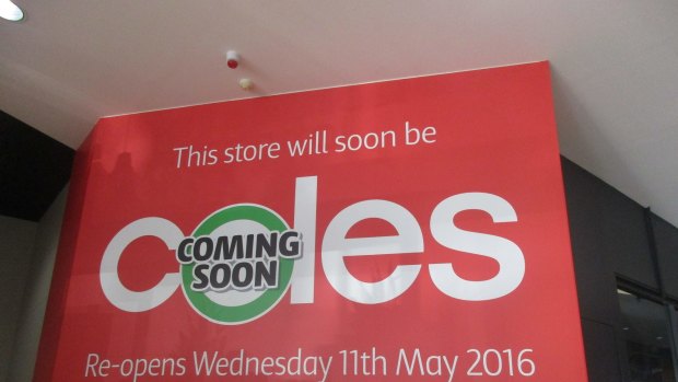 Hoardings have gone up at the entrance to Wanniassa Supabarn which won't reopen until May 11 as it is transformed into a Coles supermarket.