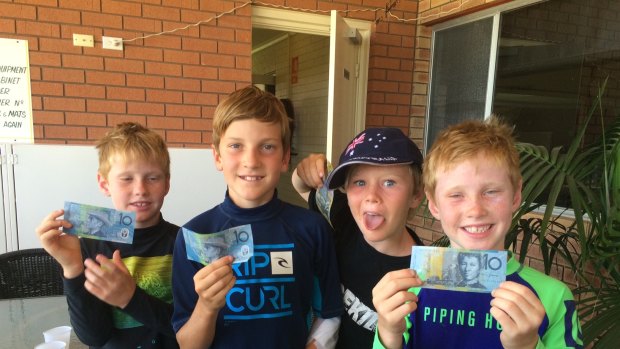 from left to right Riley Dawe, Trent Ramshak, Oscar Barrett and Josh Dawe
with their winnings. Riley Trent and Josh picked up $10 each for their Boomerang in the 8 year old and over category, while Oscar scooped
$50 for his hand in helping his family create 'the Couch'