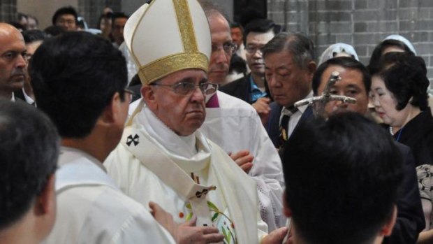 Pope Francis attends a Mass for peace at Myeong-dong cathedral in Seoul, South Korea.