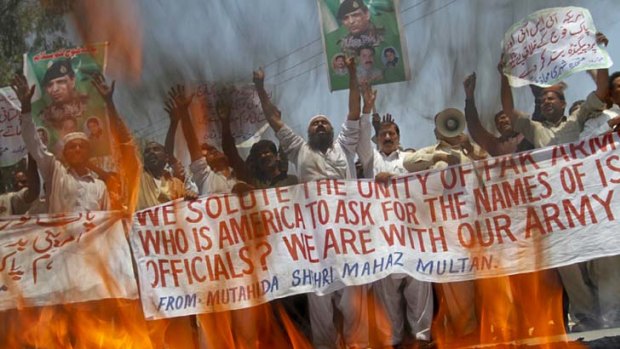 Red-hot anger ... protesters vent their spleen at suggestions their government had turned a blind eye to the presence of the al-Qaeda leader Osama bin laden in Pakistan.