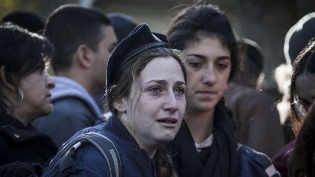 JERUSALEM, ISRAEL - JANUARY 09: Relatives and family members of Shira Hajaj mourn during her funeral on January 9, 2017 in Jerusalem, Israel. Hajaj was one among the four soldiers killed during the truck attack the previous day. (Photo by Ilia Yefimovich/Getty Images)