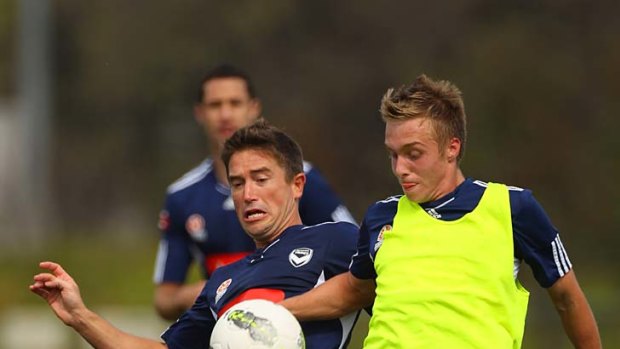 Hard at it: Harry Kewell and Jimmy Jeggo.