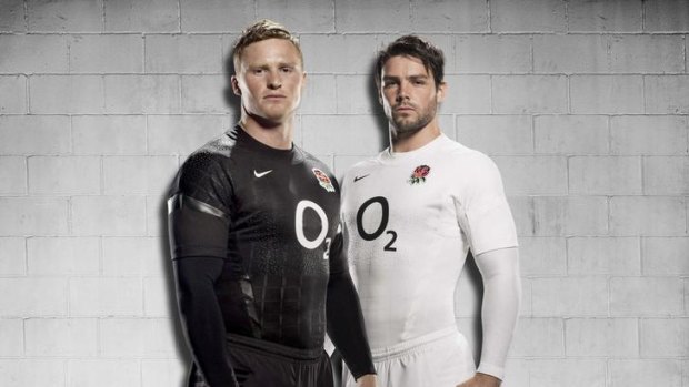 Black furore ... England's Chris Ashton (L) and Ben Foden are seen in their new home and away jerseys.