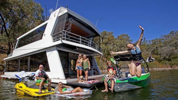 The Courtney family and friends at home and at play on Lake Eildon.