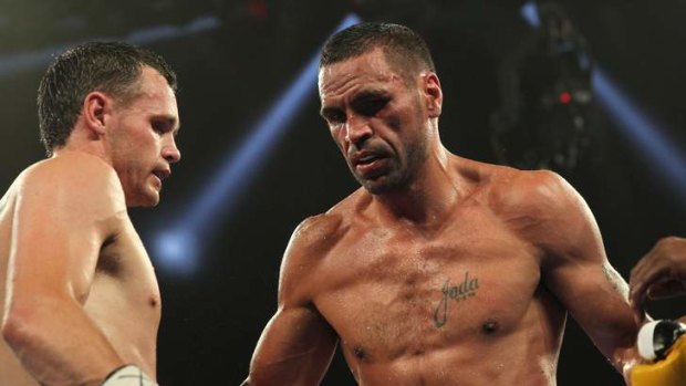 Trading places: Daniel Geale (left) and Anthony Mundine during their title fight this week, won by Geale in a unanimous points decision.