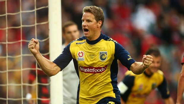 Bitter split: Former Mariners stalwart celebrates his goal in the 2013 A-League grand final.