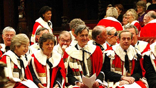 Lords in resplendent regalia at the Palace of Westminster.