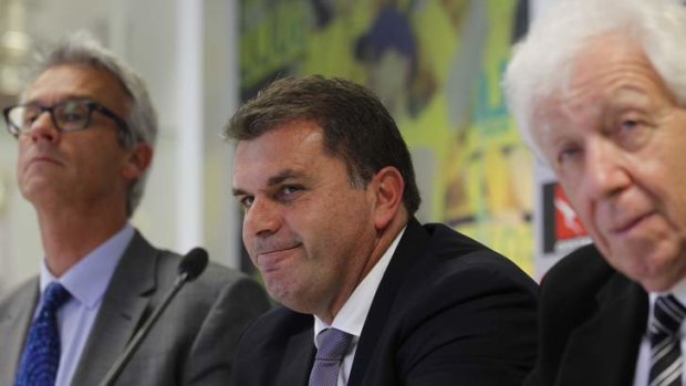 He's the man: New Socceroos coach Ange Postecoglou flanked by FFA CEO David Gallop and chairman Frank Lowy.