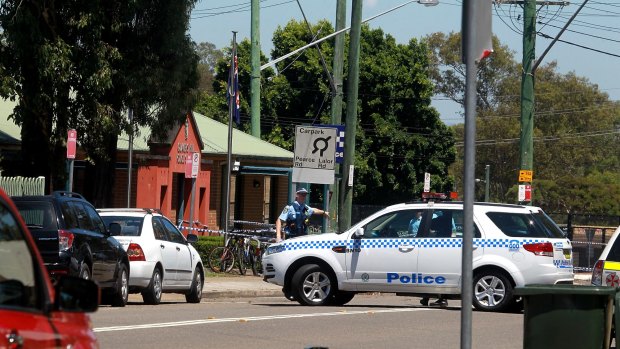 The man died after allegedly threatening officers at Quakers Hill police station.