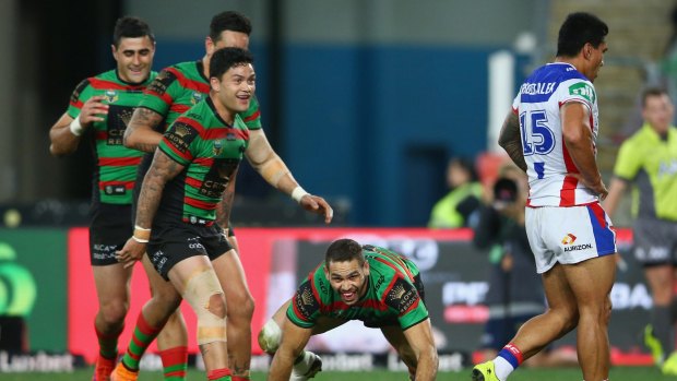 Prolific: Greg Inglis celebrates scoring his third try during the round-20 NRL match between the South Sydney Rabbitohs and the Newcastle Knights.