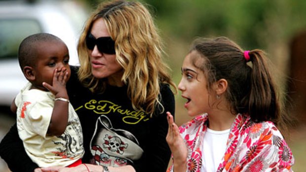 Madonna with her adopted son David Banda and daughter Lourdes in Malawi in 2007.