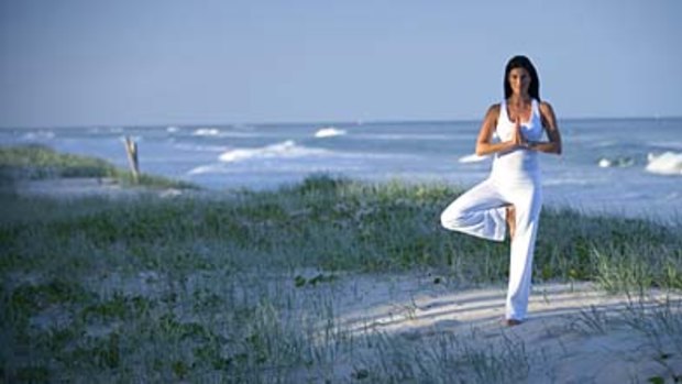 Poise ... sand-in-the-toes yoga.