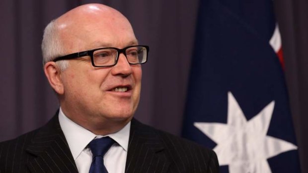 George Brandis: Muslim leaders "vital partners" in stopping Australians from fighting in the Middle East.