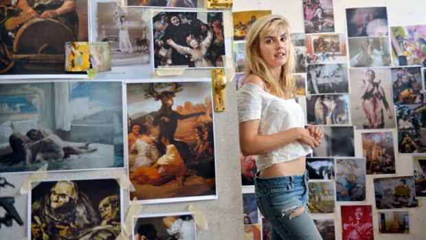 Artist Sophia Hewson surrounded by images that inspire her. On Saturday night this self-described 'happy, bubbly blonde' will make art with a sheep's heart.