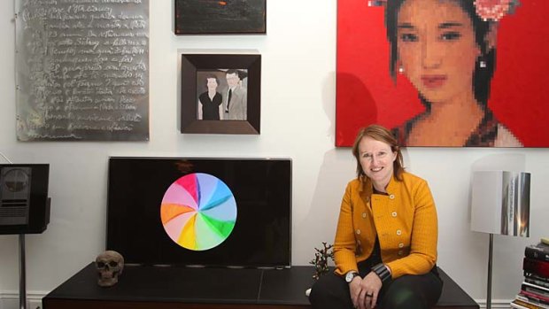 Kate Mills and her video art installation in her apartment.