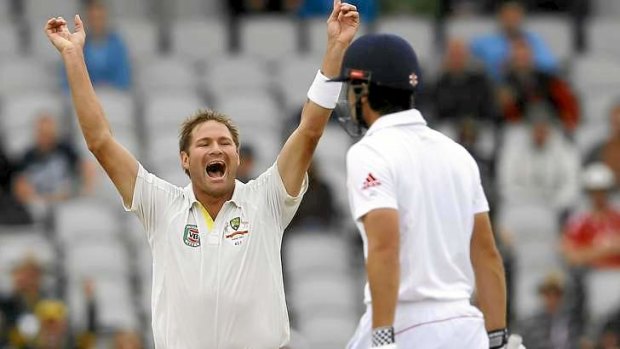 Ryan Harris celebrates the wicket of England's captain Alastair Cook.