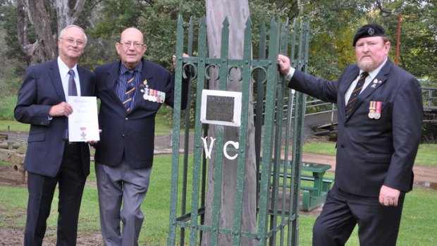 From left: Neville Harris, with Euroa RSL officers Phil Munt and Fred Wawrzik at VC winner Alex Burton's memorial.