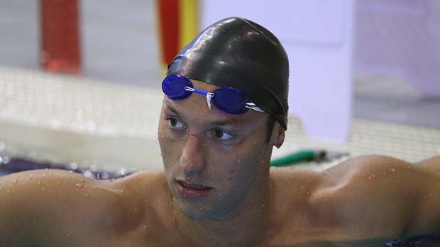 Ian Thorpe warms up before competing in the men's 200 metre Freestyle.
