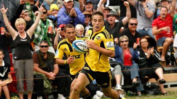 Sideline eyes ... the Hurricanes fans literally had a field day with the home side's 35-31 win over the  Chiefs. The match in a cow paddock north of Wellington attracted 10,000.