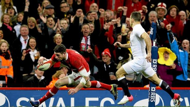 Alex Cuthbert of Wales touches down to score his team's second try.