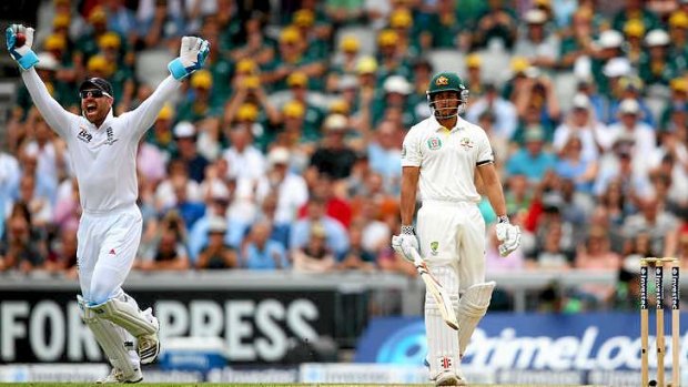 Controversy: Matt Prior of England celebrates after taking a catch to dismiss Usman Khawaja. Neither replays nor Hot Spot provided any evidence that he hit the ball.