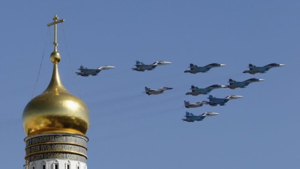 Flexing its muscle ... Russian military jets fly above the Kremlin. Russia's new stance has Norway worried.