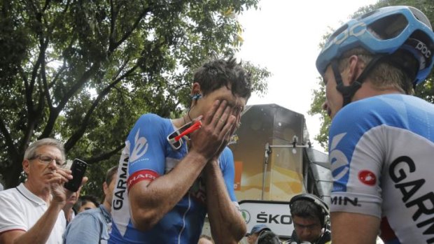 Heartbreak: Kiwi rider Jack Bauer breaks down after being overtaken in the dying stages of the Tour de France's 15th stage.