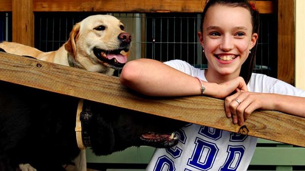 Understanding &#8230; Felicity Jackson, with her dogs Gracie and Bella, was teased about her Tourette symptoms but says life became easier after her mother explained the condition to her classmates.