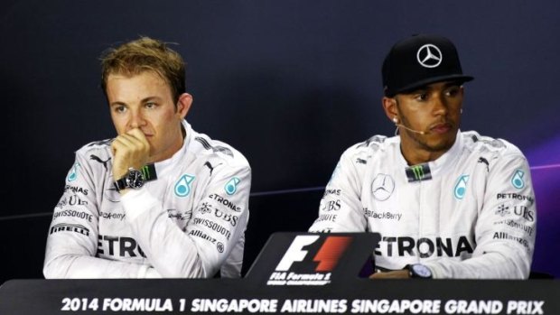 Nico Rosberg (L) was pipped to pole position by his teammate Lewis Hamilton (R).