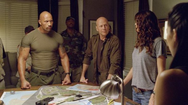 Rock solid: Dwayne Johnson and Bruce Willis toughen up.