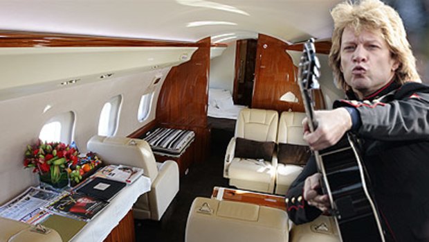 Total luxury . . . inside the Bombardier Global express XRS and right, Jon Bon Jovi wishing that he had one.