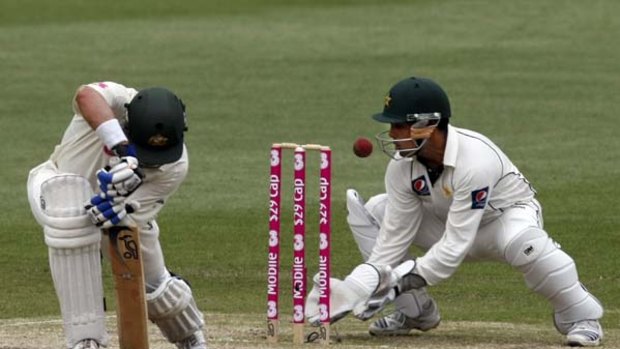 Another one down ... Mike Hussey was dropped three times by Pakistan keeper Kamran Akmal.