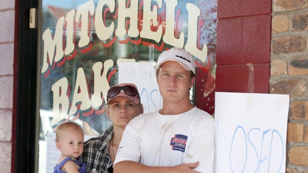 Kyle and Fiona Mansfield with their neice ouside their bakery in Mitchell.