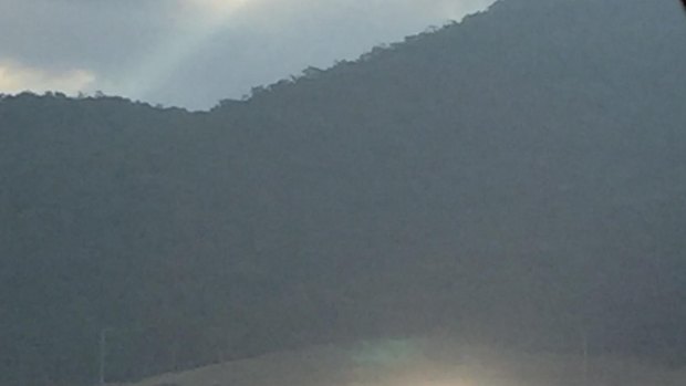 Glare from the Royalla solar farm as seen from the Monaro Highway at 6.40pm on January 23 this year.