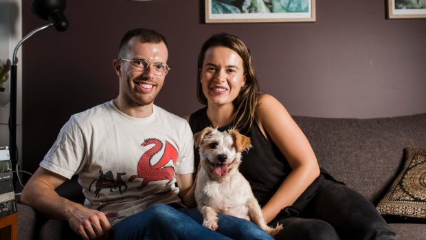 Turner couple David Kearns and Alisa Draskovic are the proud new owners of Lochie, the dog recently rescued by RSPCA ACT.