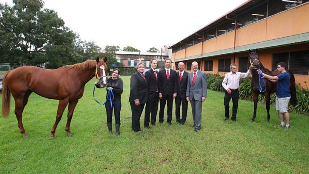 The tyro owners and the syndicators: John Saunders, Triple Crown's Chris and Michael Ward, and John Hezlett and Steve Graham with their Golden Slipper entrants Dothraki  and Charlie Boy (far right) and trainer Gerald Ryan (white shirt).