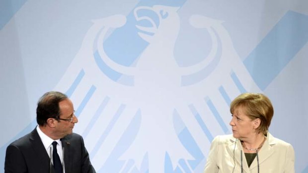 Disagreements &#8230; the French President, Francois Hollande, meets the German Chancellor, Angela Merkel, for their first talks on the debt crisis in Europe.