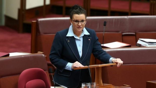 Jacqui Lambie "deeply insulted" a photographer by using her photo a female police officer who was killed by the Taliban.