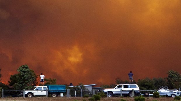The fires destroyed 40 homes, some of them premium beachfront mansions.